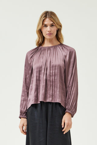 PLEATS TO MEET YOU TOP