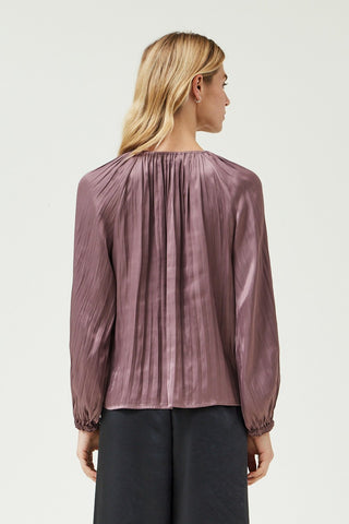 PLEATS TO MEET YOU TOP