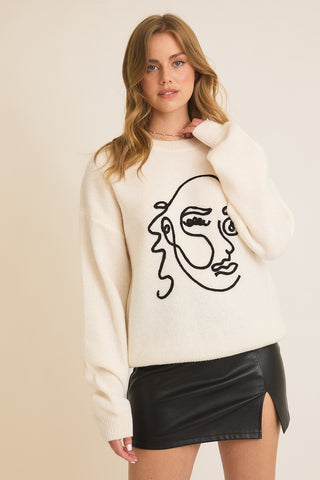 ABSTRACT FACE SWEATER