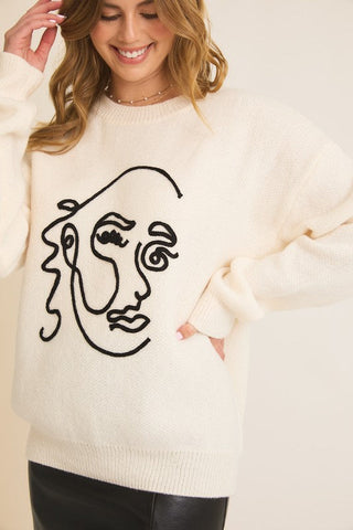 ABSTRACT FACE SWEATER