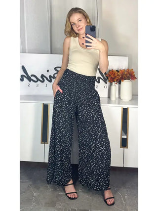 HIGH WAISTED POLKA DOT FLOWY PANTS