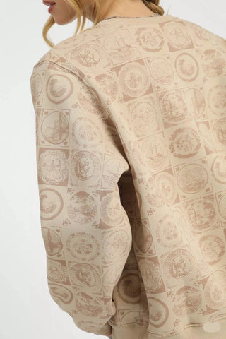 Beige patterned garment with a neutral background