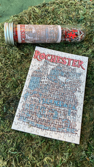 Jigsaw puzzle of Rochester with packaging on a grassy background