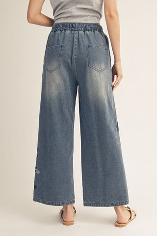 STAR PATCH DENIM WASHED PANTS
