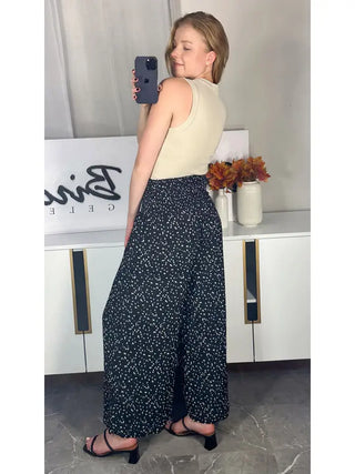 HIGH WAISTED POLKA DOT FLOWY PANTS